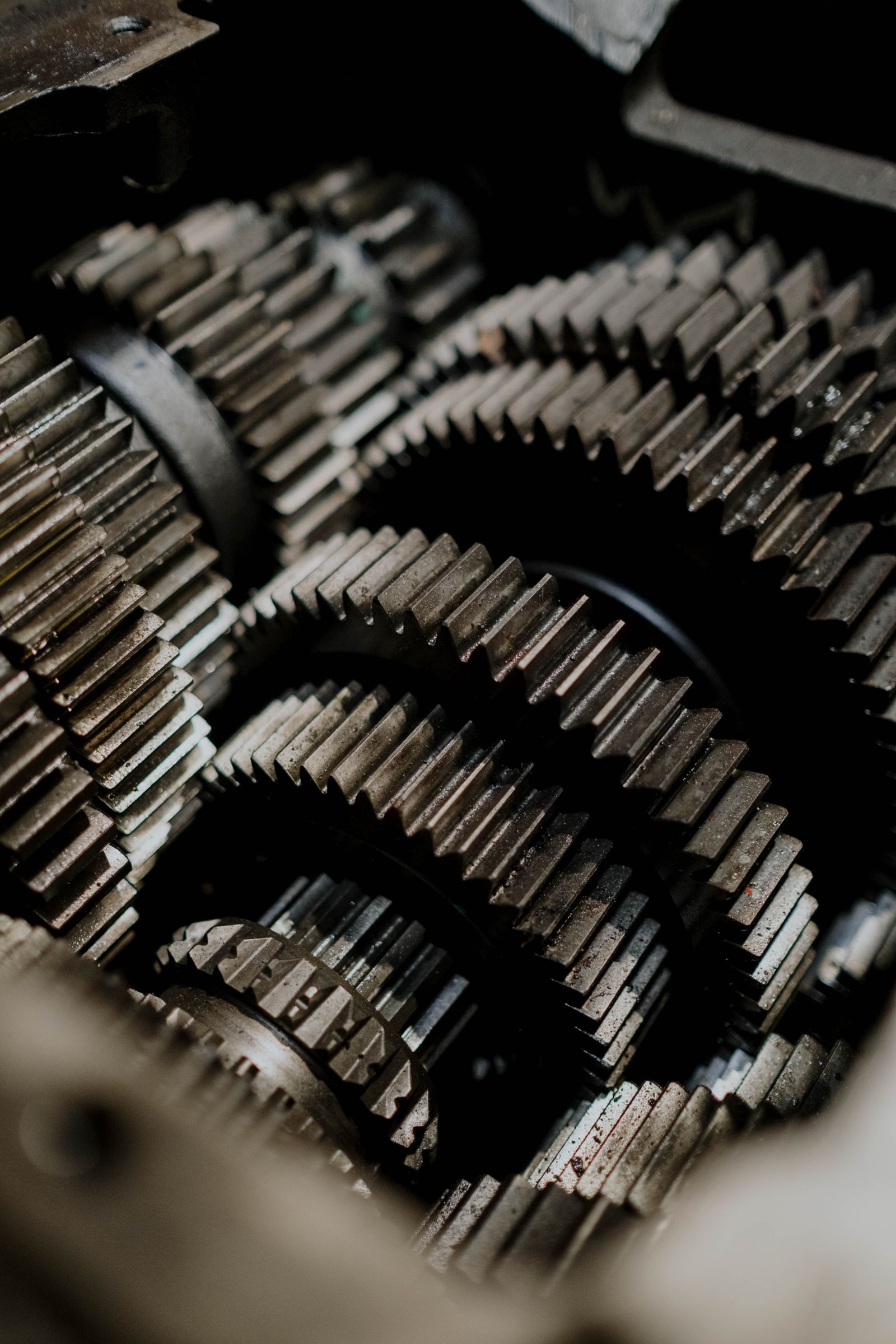 Illustrative close-up stock photo of transmission gears — not A & K's own parts.