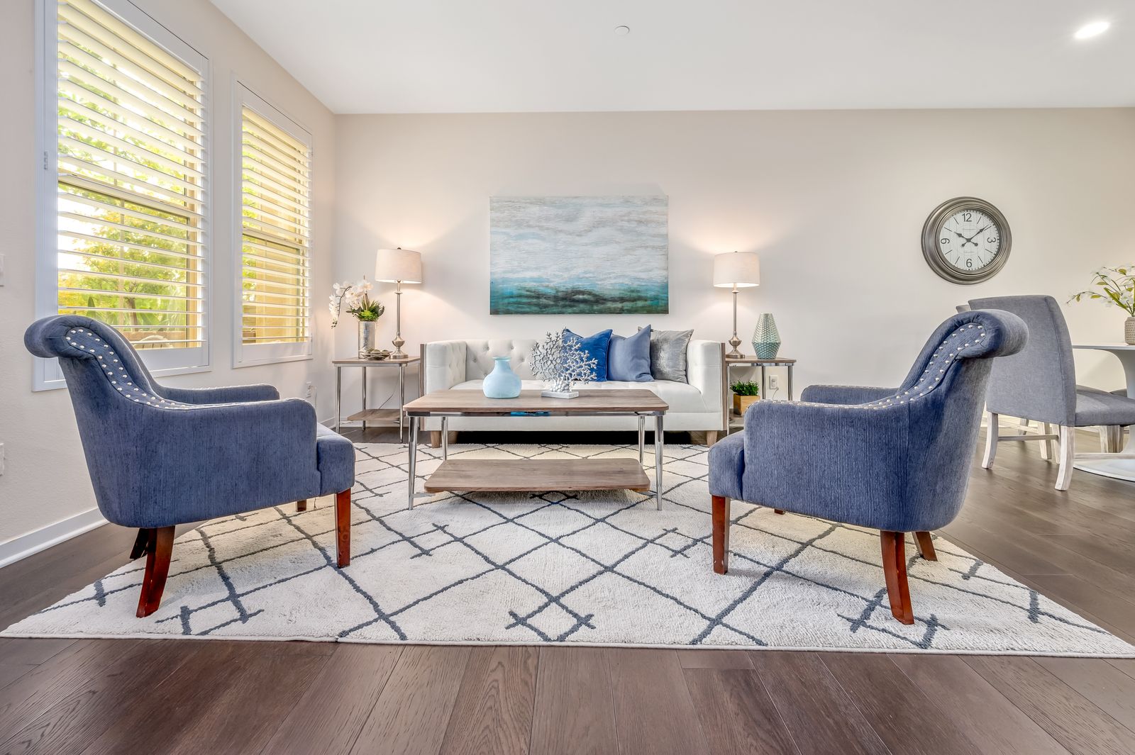 A spacious, clean, cozy living room with fresh carpet and stylish decor — illustrative stock photo, not a photo of an Allstar Carpet Cleaning job.