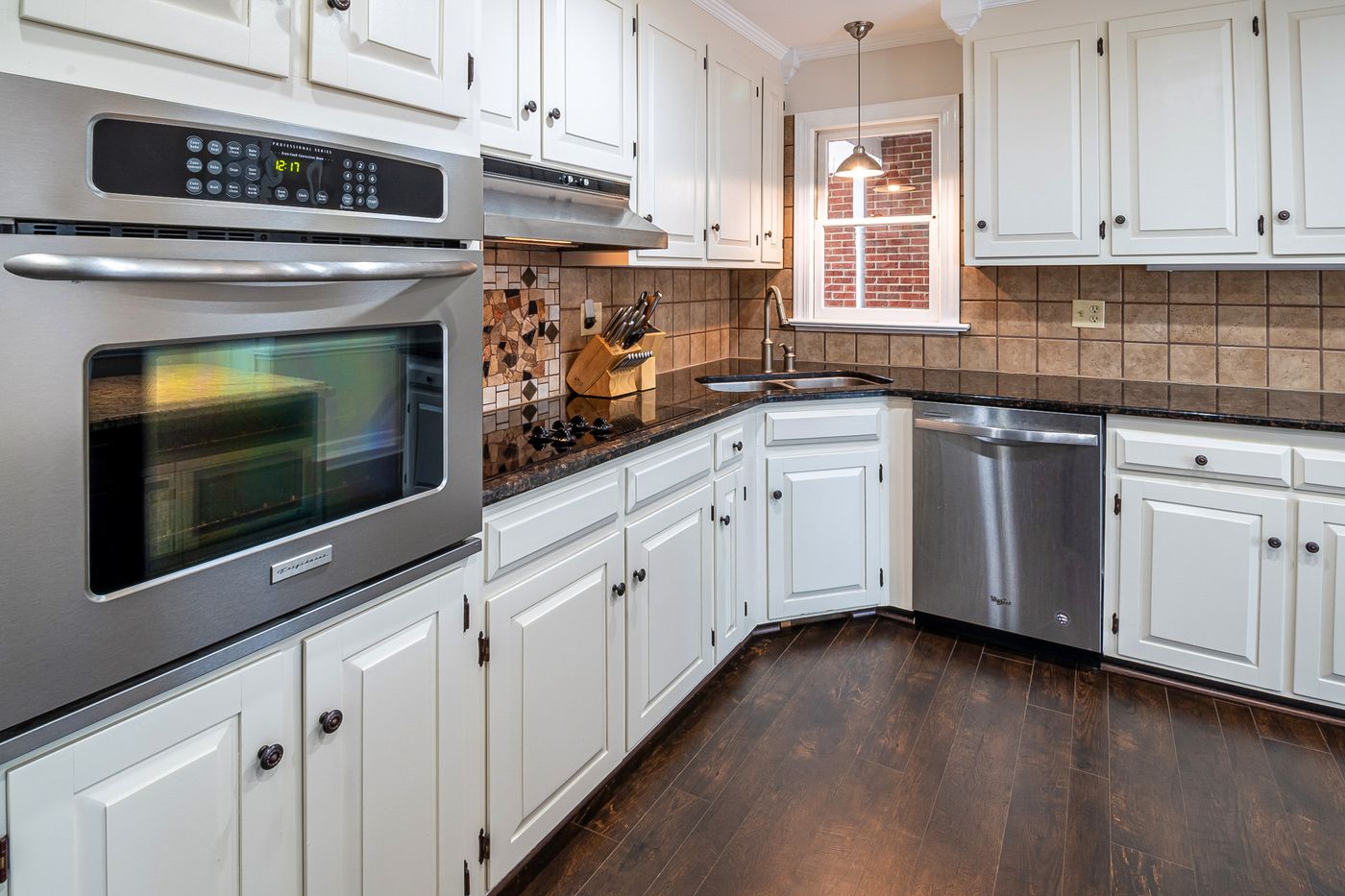Kitchen with custom cabinetry and appliances, illustrative stock photo