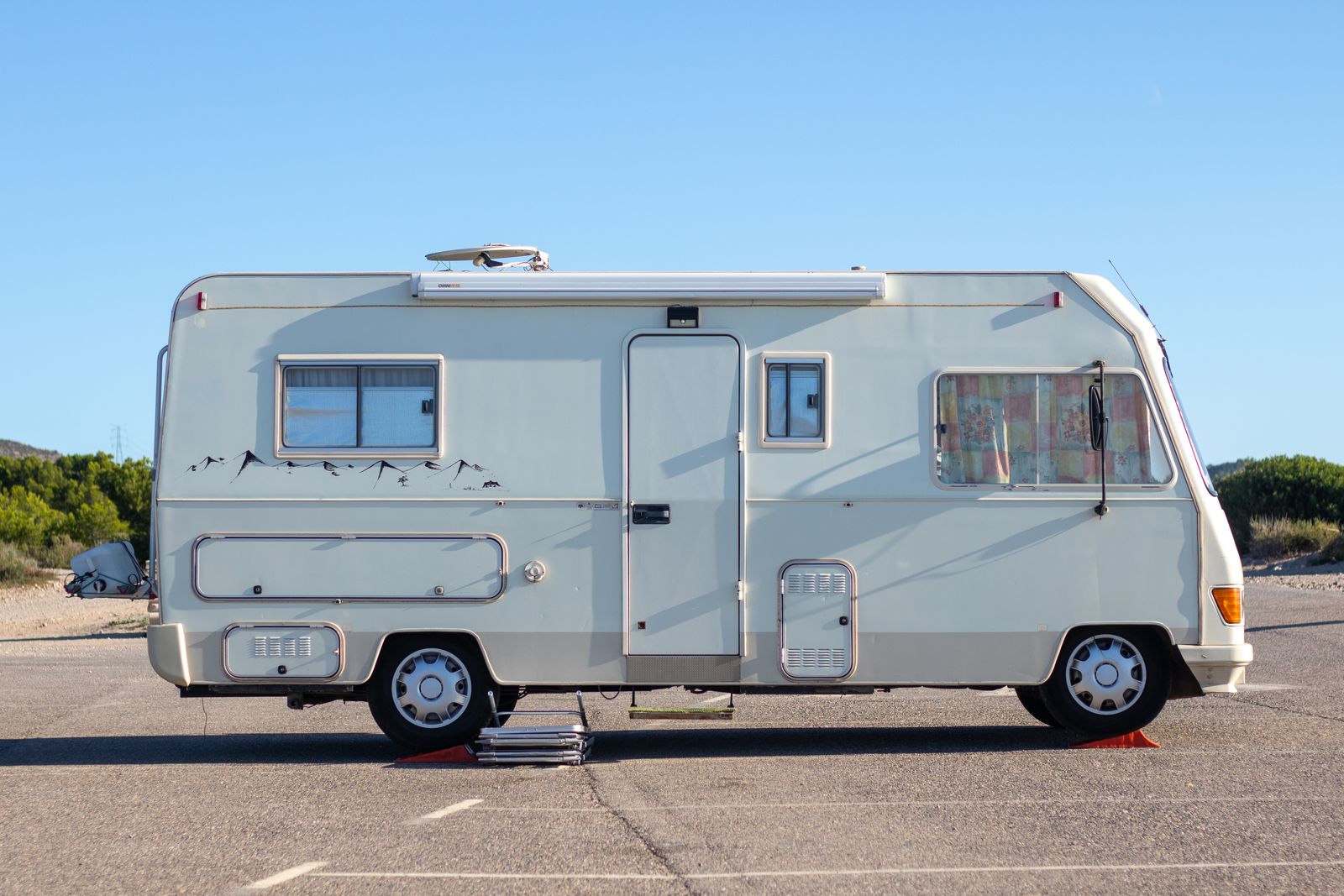 Illustrative stock photo of a camper van on the open road — not Lane's actual vehicle or a customer's RV.