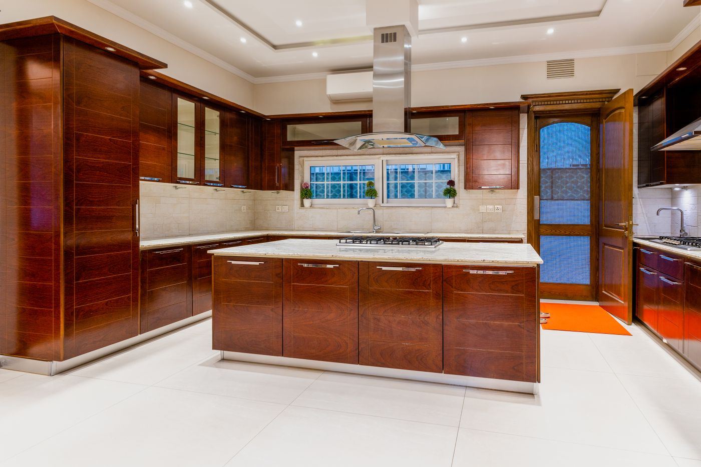 Kitchen with a stone countertop island, illustrative stock photo