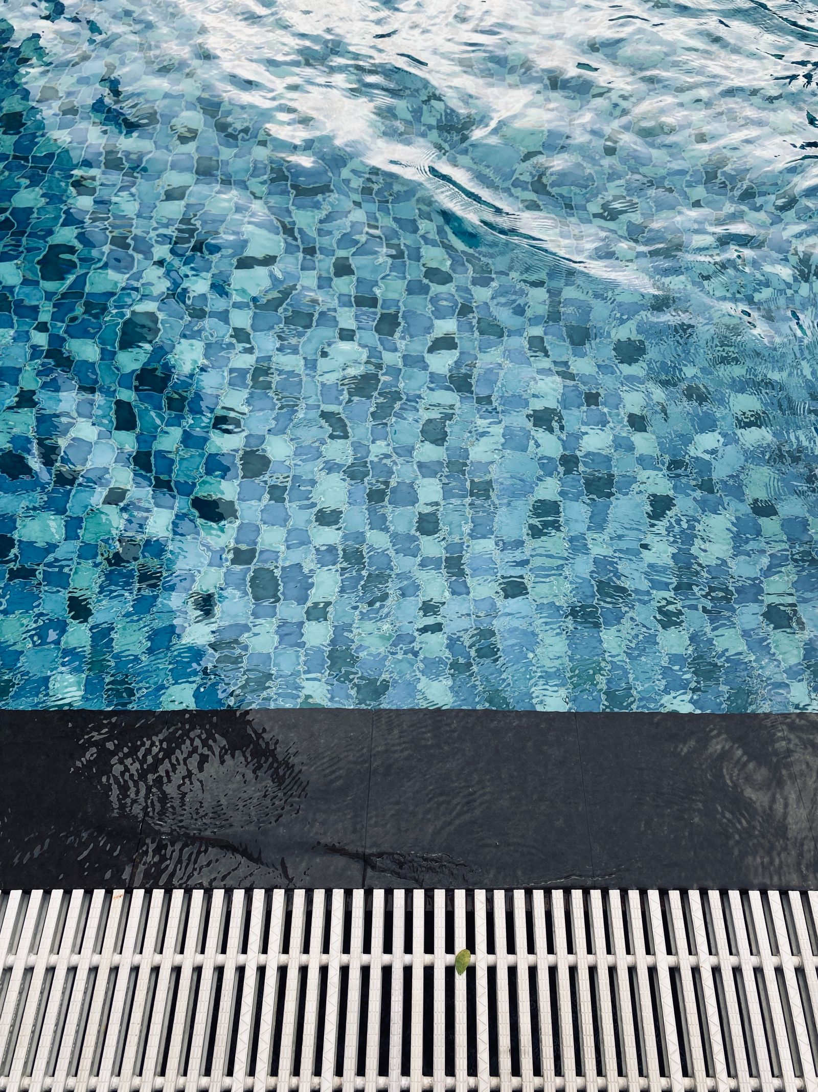 Close-up of clear blue swimming pool water with ripples — illustrative stock photo, not an actual Sunrise Pool & Spa customer's pool.